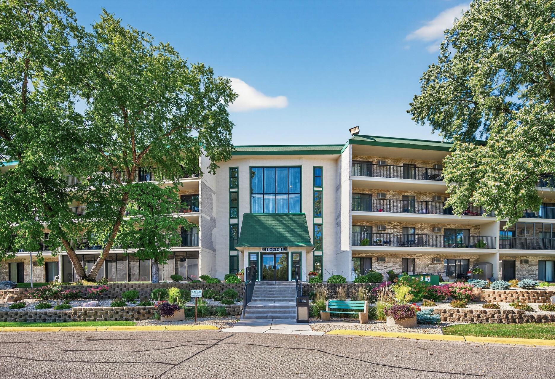 View of (CC) High Rise (4+ Levels) at 10501 Cedar Lake Road, Minnetonka - Mike Wilen | Minnesota Team Real Estate