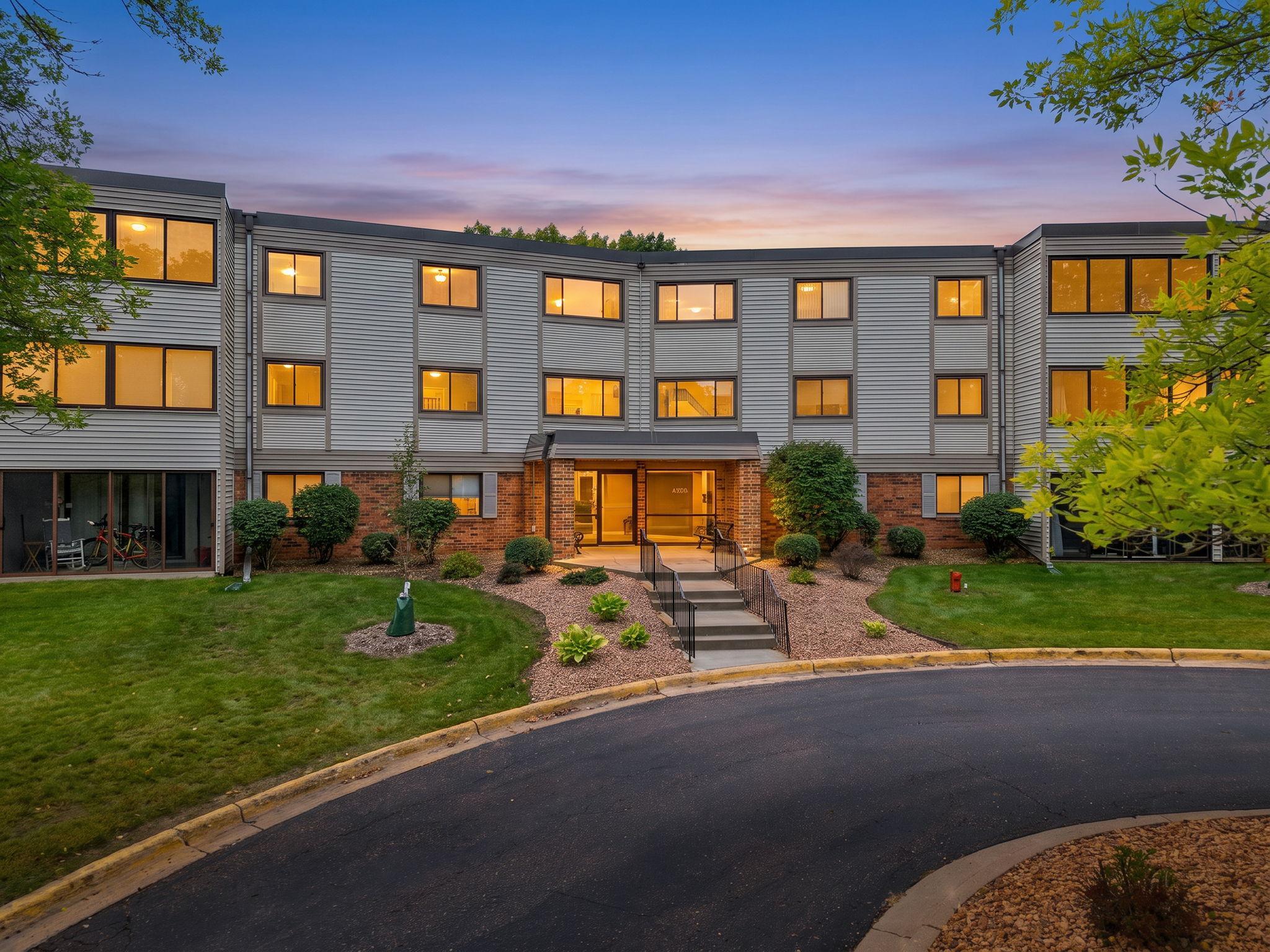 View of (CC) Low Rise (3- Levels) at 4385 Trenton Lane, Plymouth - Mike Wilen | Minnesota Team Real Estate