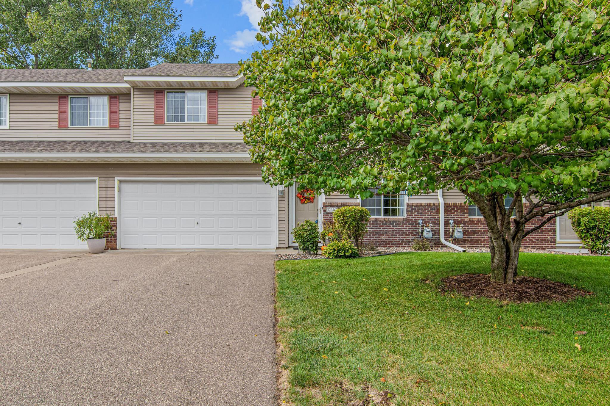 View of (TH) Side x Side at 3204 Juniper Circle, Woodbury - Mike Wilen | Minnesota Team Real Estate