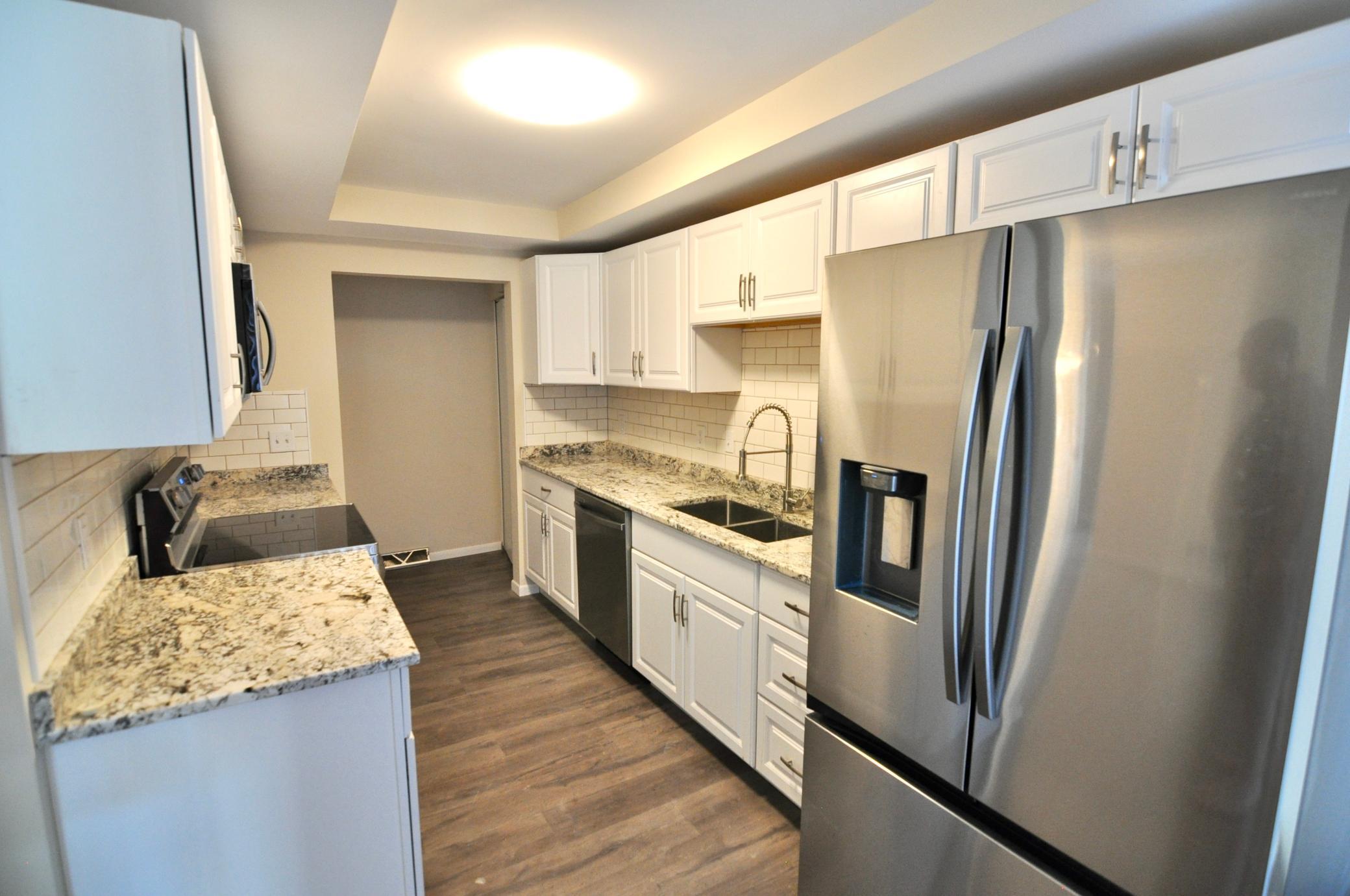 View of (TH) Side x Side at 5845 Lake Curve Lane, Brooklyn Center - Mike Wilen | Minnesota Team Real Estate