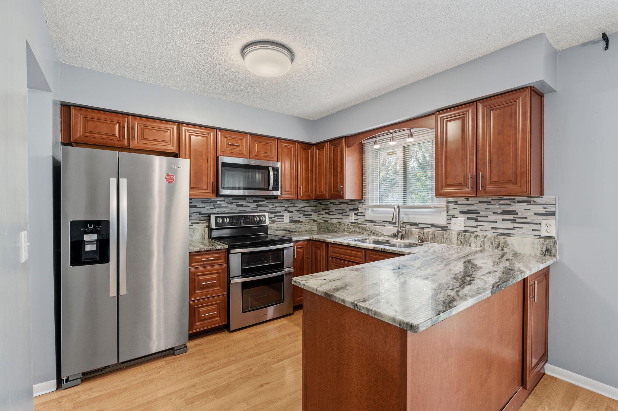 View of Residential at 1652 84th Court, Brooklyn Park MN 55444, Brooklyn Park (13 of 41) - Mike Wilen | Minnesota Team Real Estate