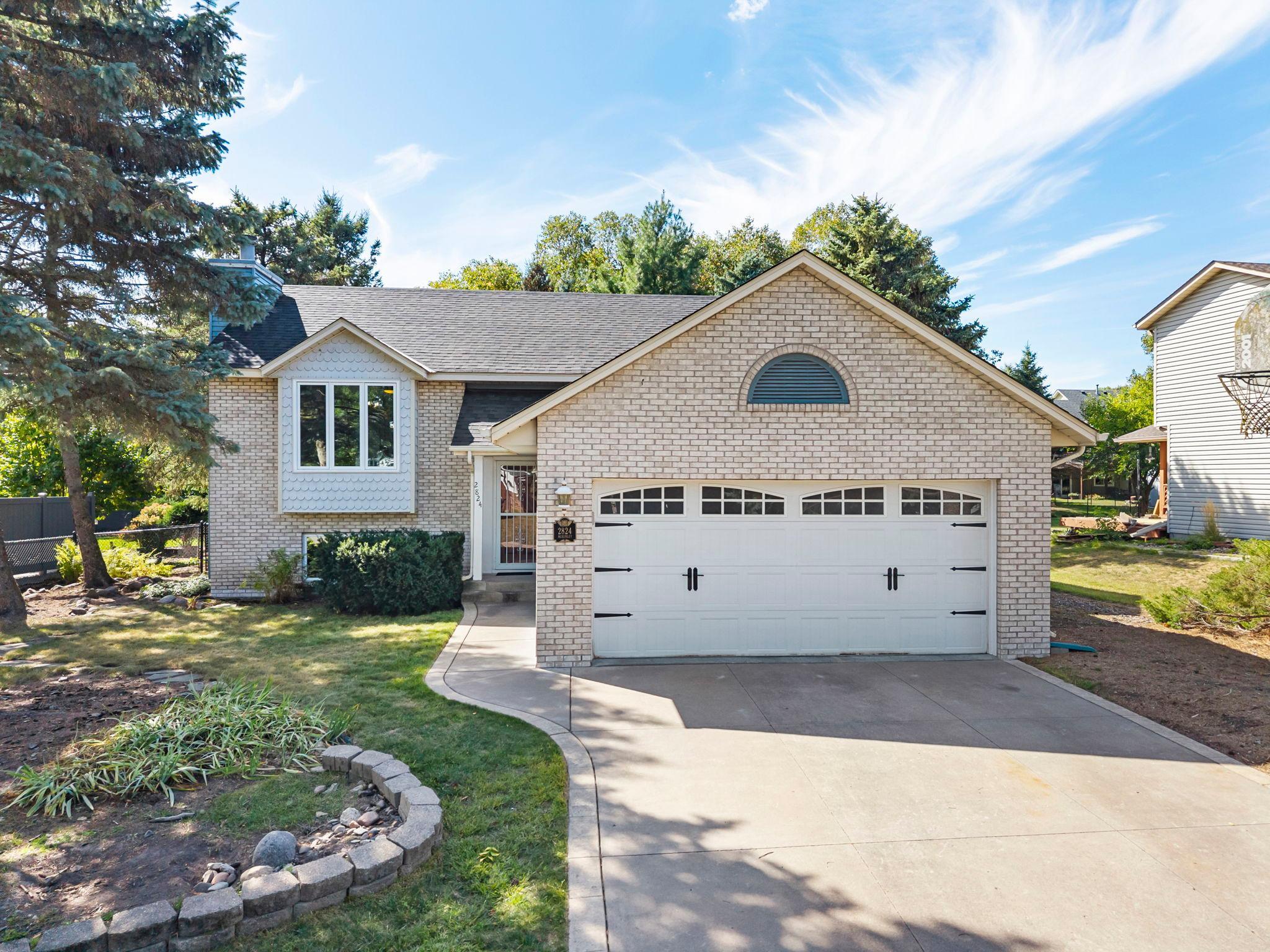 View of Single Family at 2824 Mckinley Drive, Woodbury - Mike Wilen | Minnesota Team Real Estate