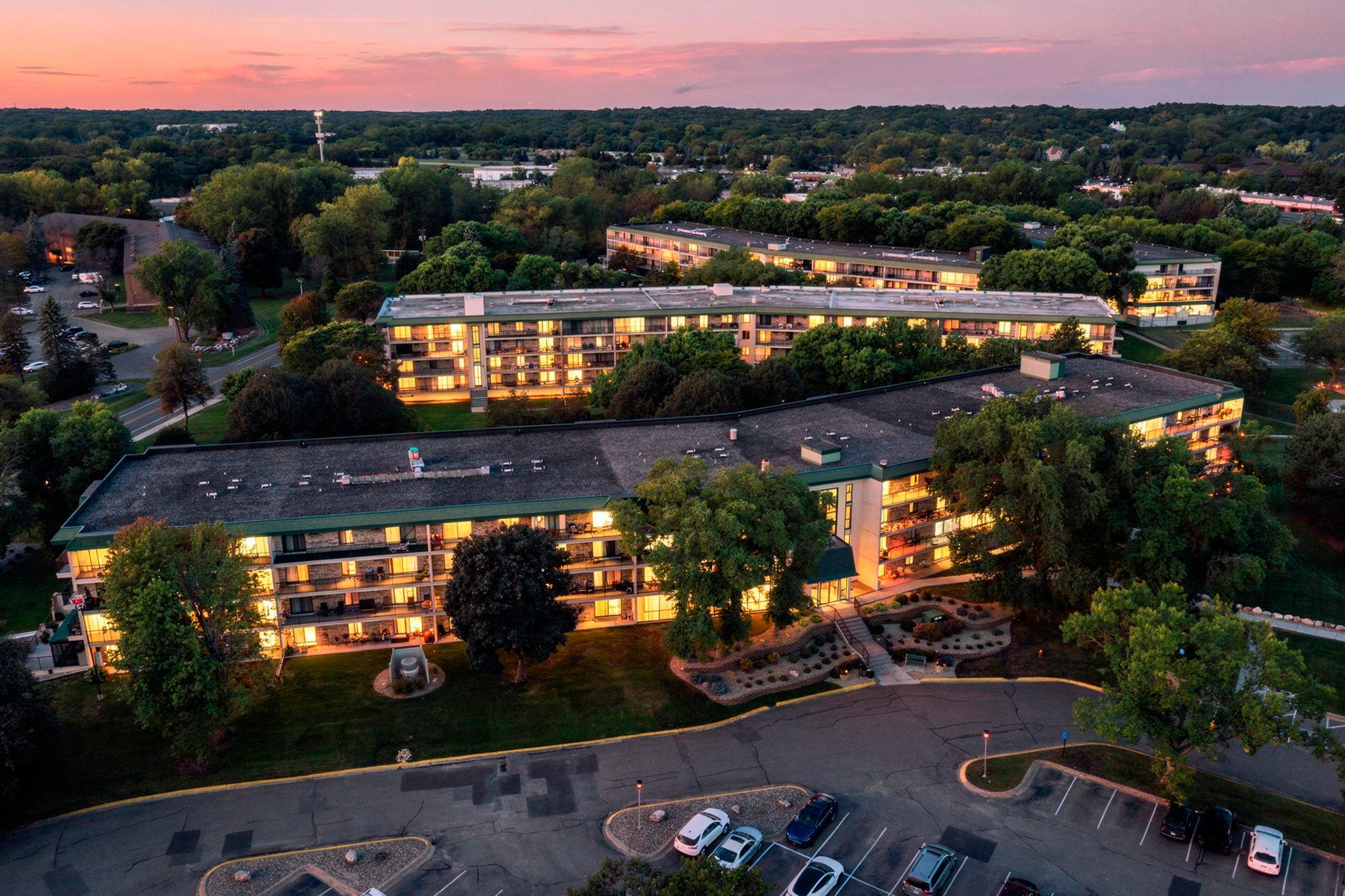 View of (CC) High Rise (4+ Levels) at 10501 Cedar Lake Road, Minnetonka - Mike Wilen | Minnesota Team Real Estate
