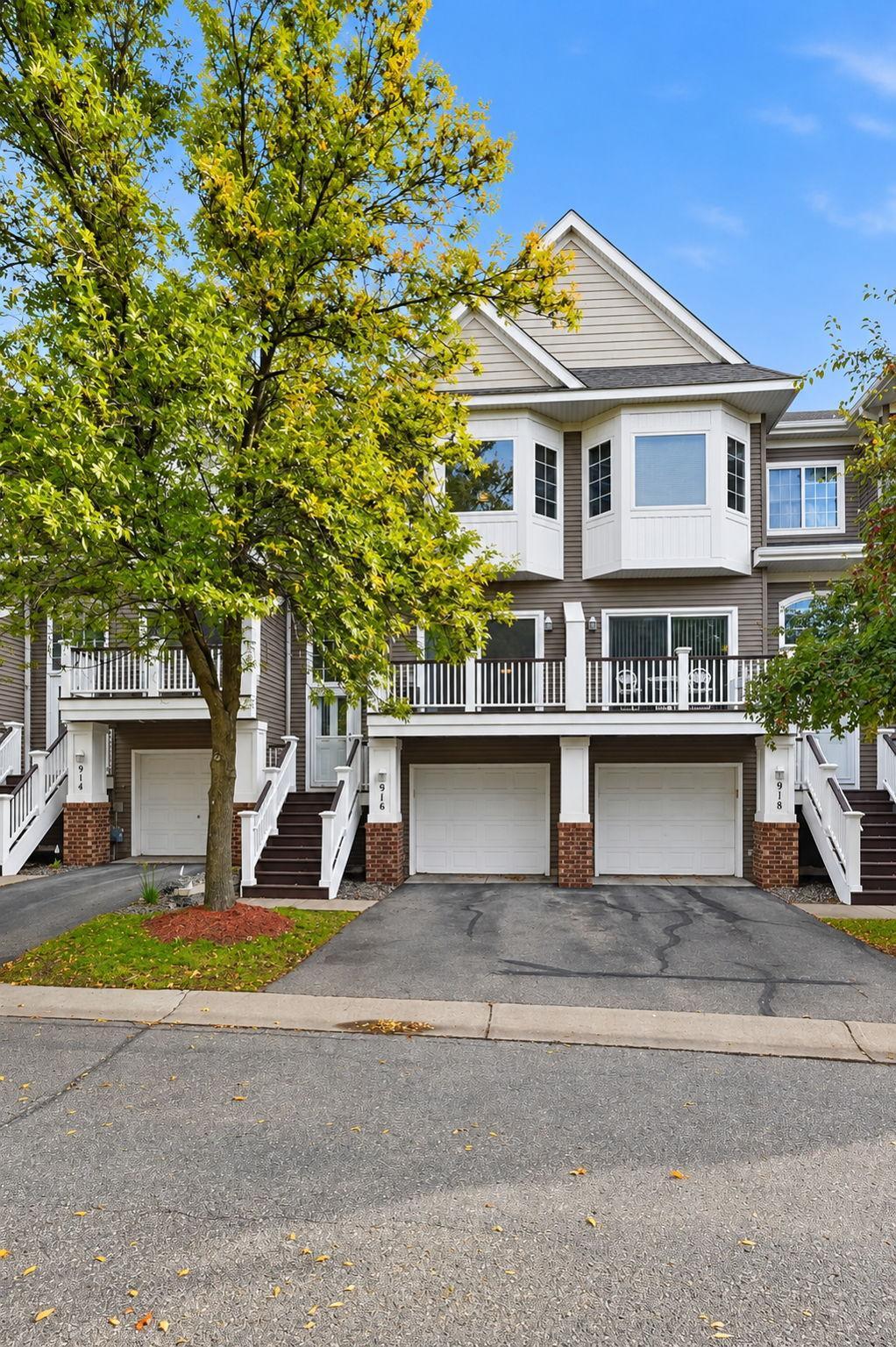 View of (TH) Side x Side at 916 Trenton Lane, Plymouth - Mike Wilen | Minnesota Team Real Estate