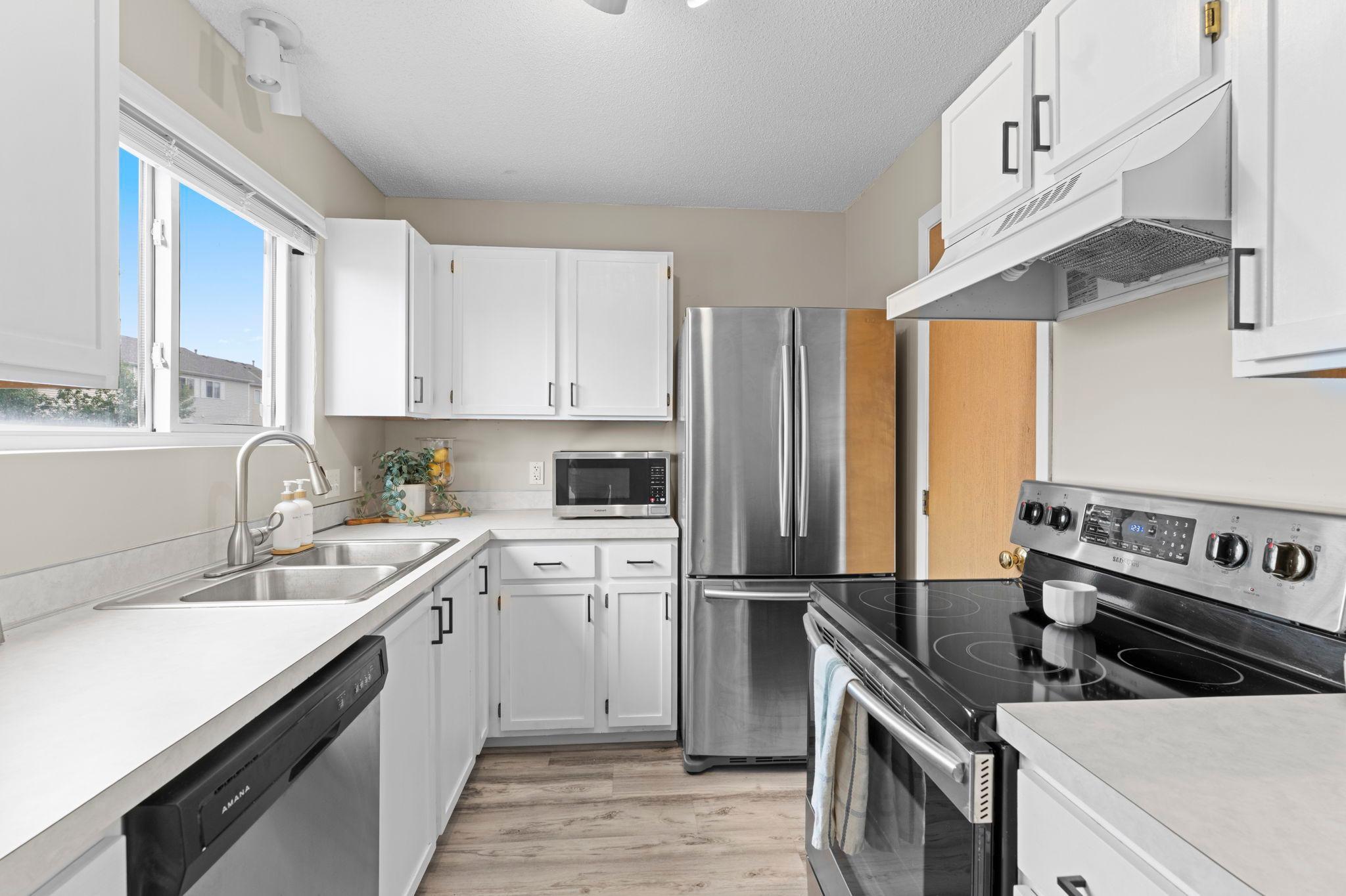 View of (TH) Side x Side at 13092 Murdock Terrace, Eden Prairie - Mike Wilen | Minnesota Team Real Estate