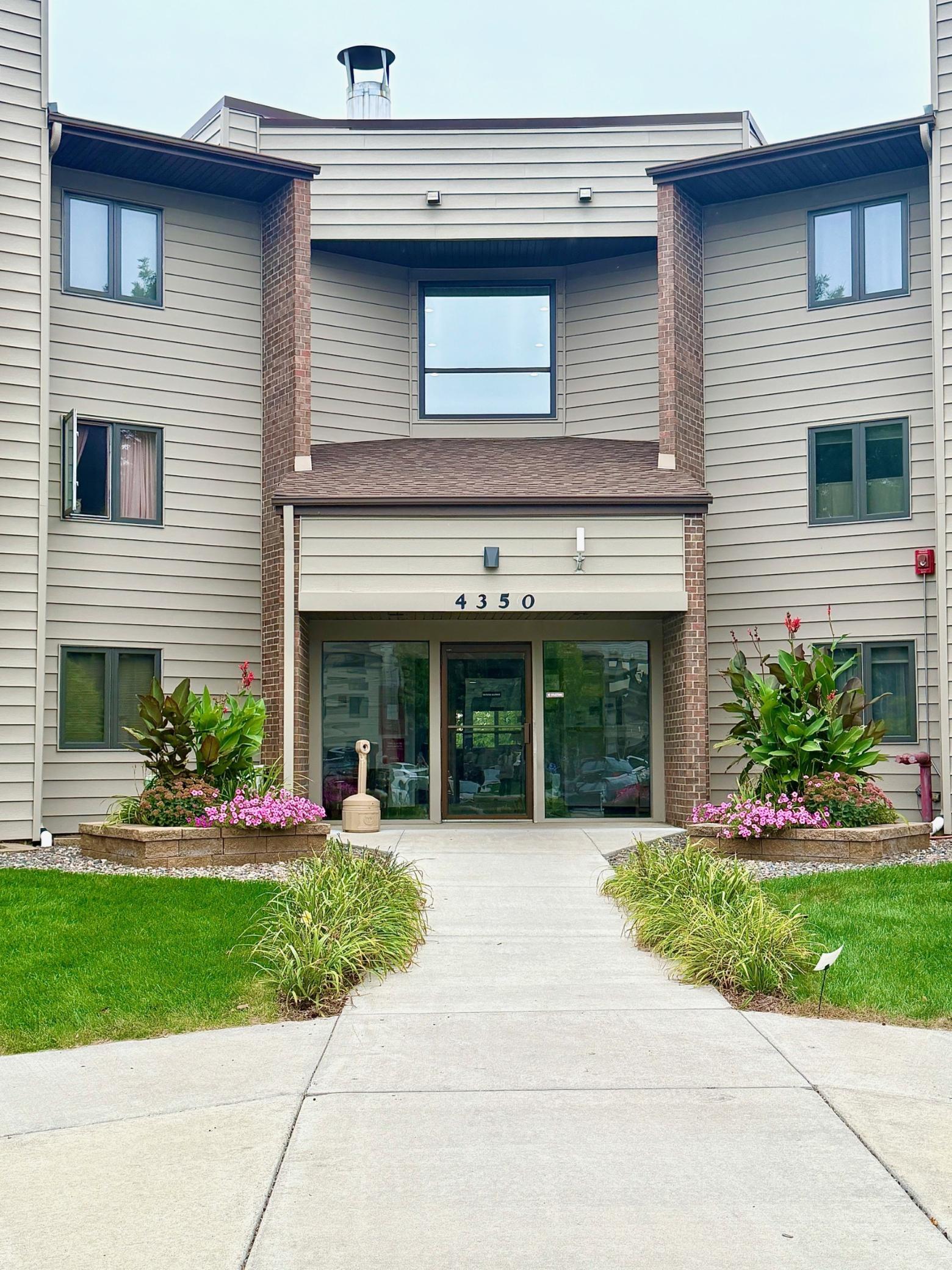 View of (CC) Low Rise (3- Levels) at 4350 Trenton Lane, Plymouth - Mike Wilen | Minnesota Team Real Estate