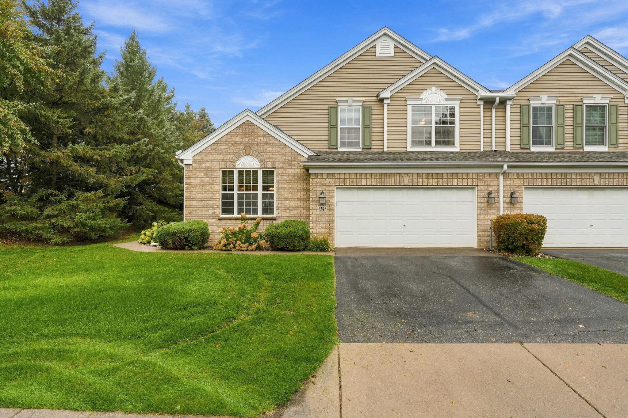 View of (TH) Side x Side at 7147 Arthur Drive, Woodbury - Mike Wilen | Minnesota Team Real Estate