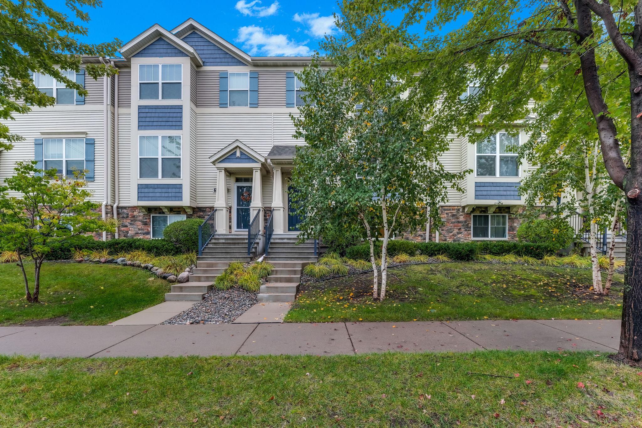 View of (TH) Side x Side at 9673 Toledo Lane, Brooklyn Park - Mike Wilen | Minnesota Team Real Estate