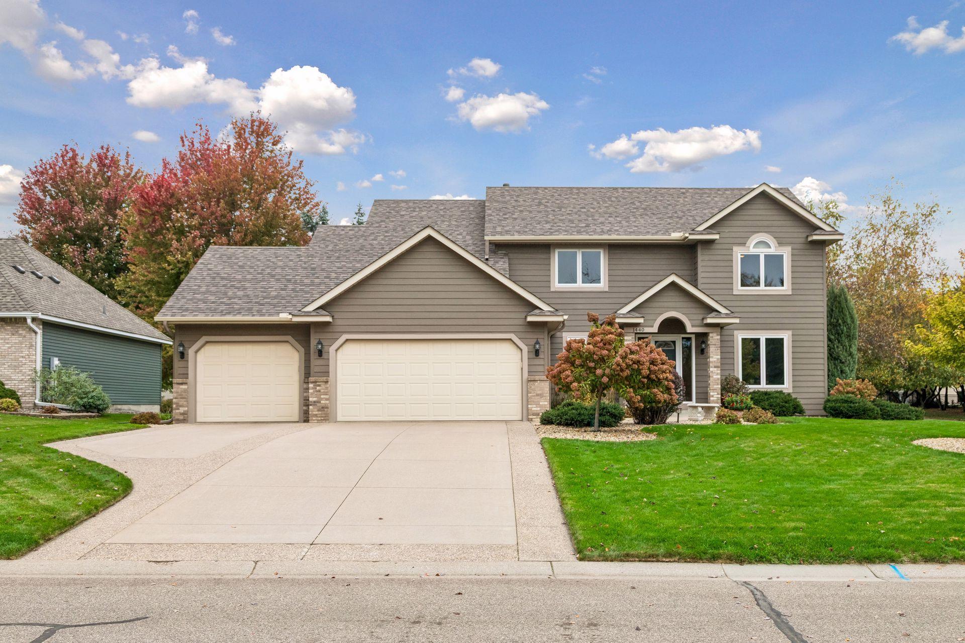 View of Single Family at 1440 Clippership Bay, Woodbury - Mike Wilen | Minnesota Team Real Estate