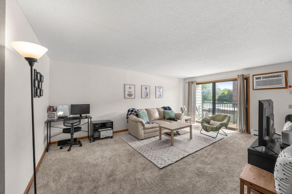 View of (CC) Low Rise (3- Levels) at 4 Pine Tree Drive, Arden Hills - Mike Wilen | Minnesota Team Real Estate