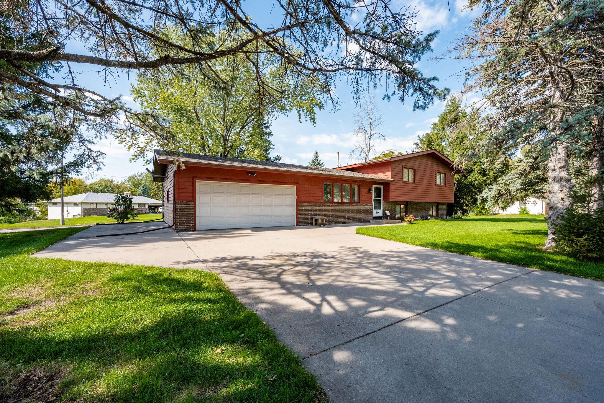 View of Single Family at 7901 Douglas Drive, Brooklyn Park - Mike Wilen | Minnesota Team Real Estate