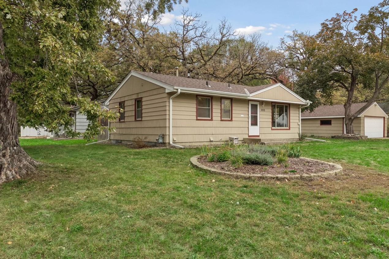 View of Single Family at 5210 52nd Avenue, Crystal - Mike Wilen | Minnesota Team Real Estate