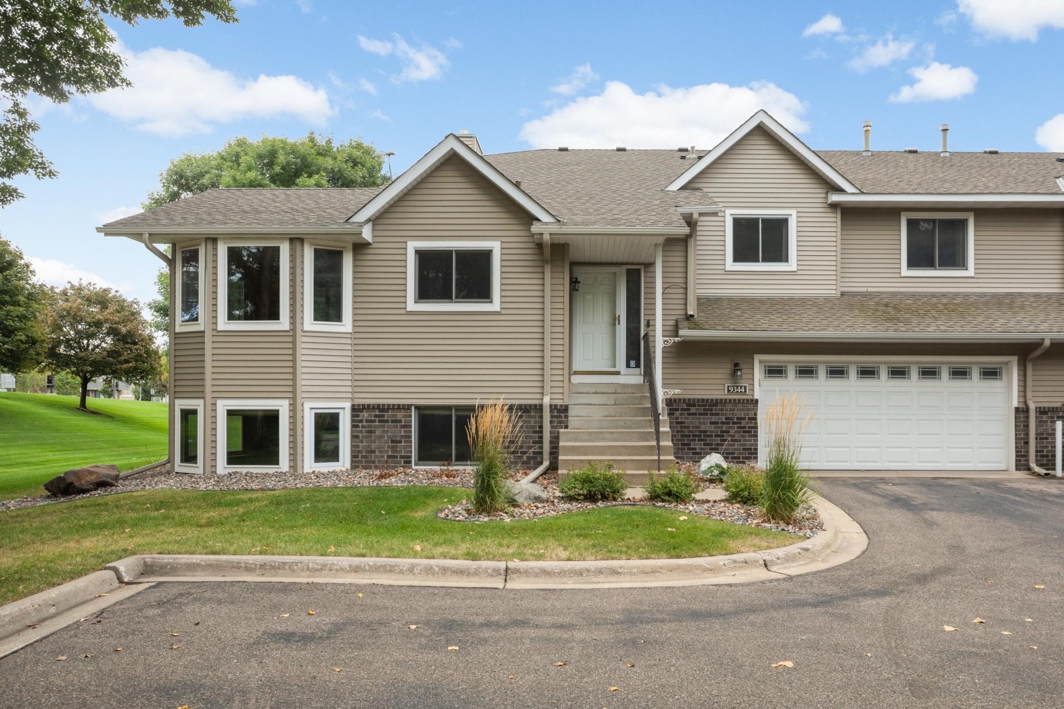 View of (TH) Side x Side at 9344 Loch Lomond Lane, Brooklyn Park - Mike Wilen | Minnesota Team Real Estate