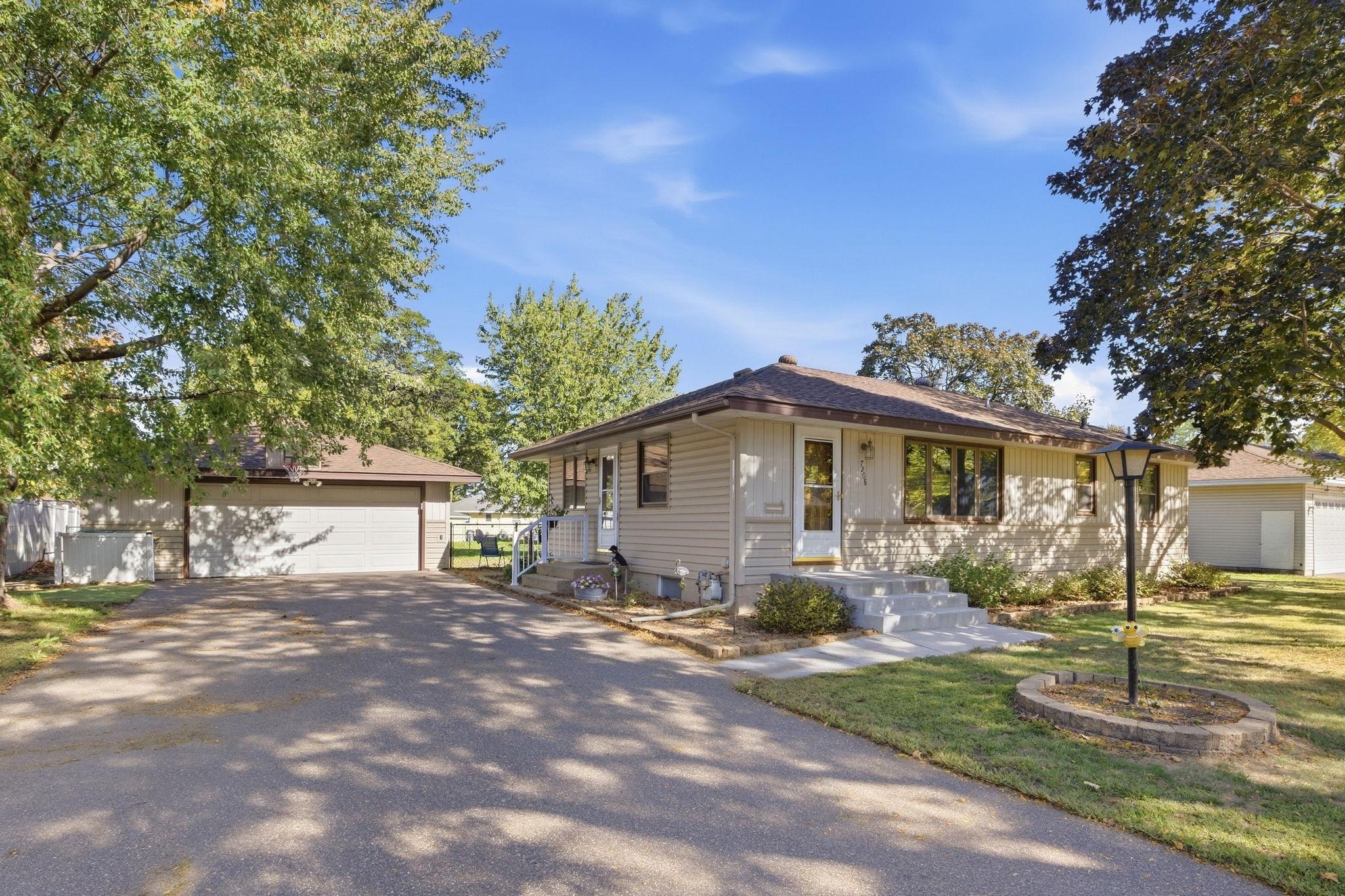 View of Single Family at 7208 Hartkopf Lane, Brooklyn Park - Mike Wilen | Minnesota Team Real Estate