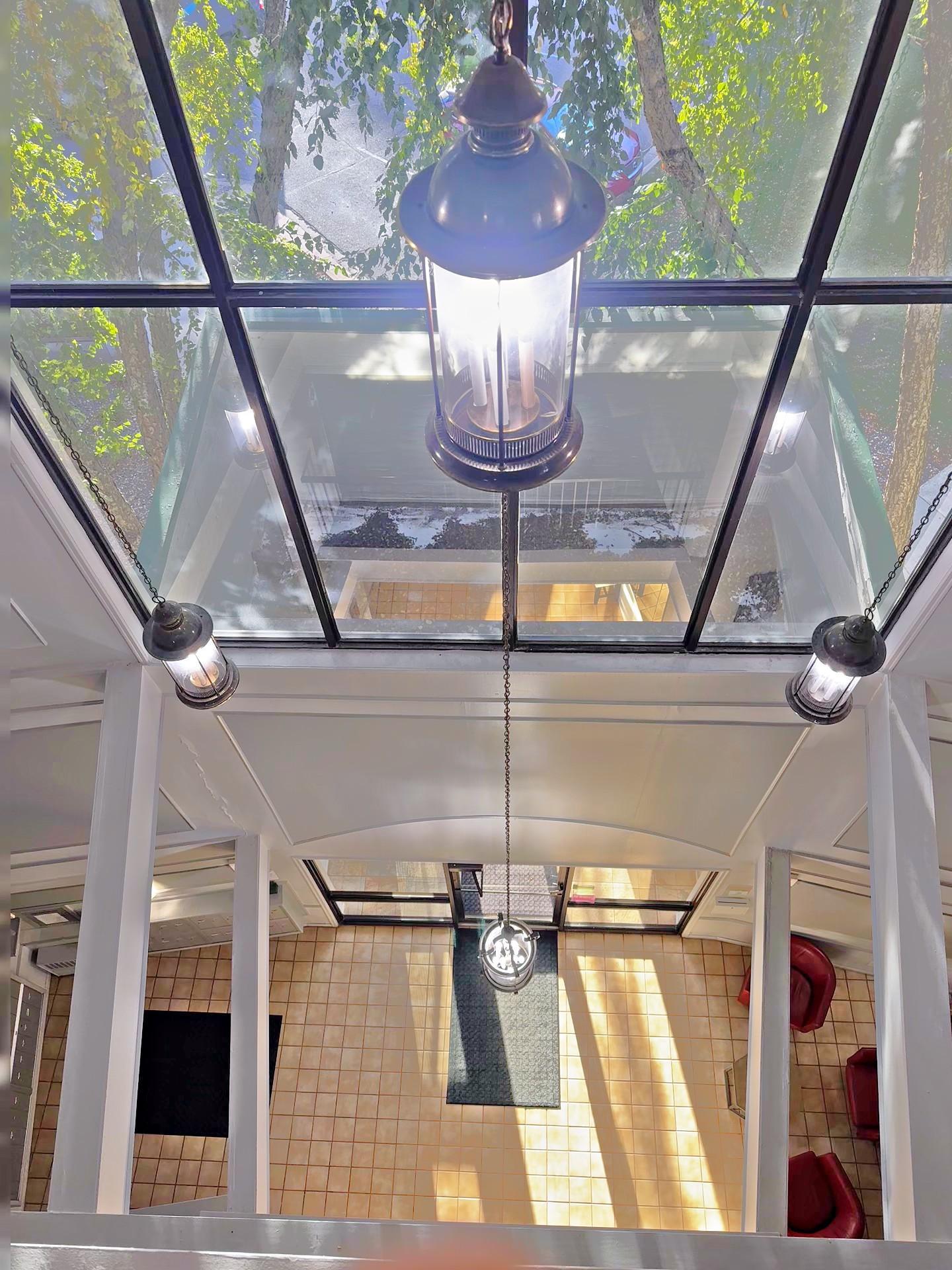 View of (CC) High Rise (4+ Levels) at 10511 Cedar Lake Road, Minnetonka - Mike Wilen | Minnesota Team Real Estate
