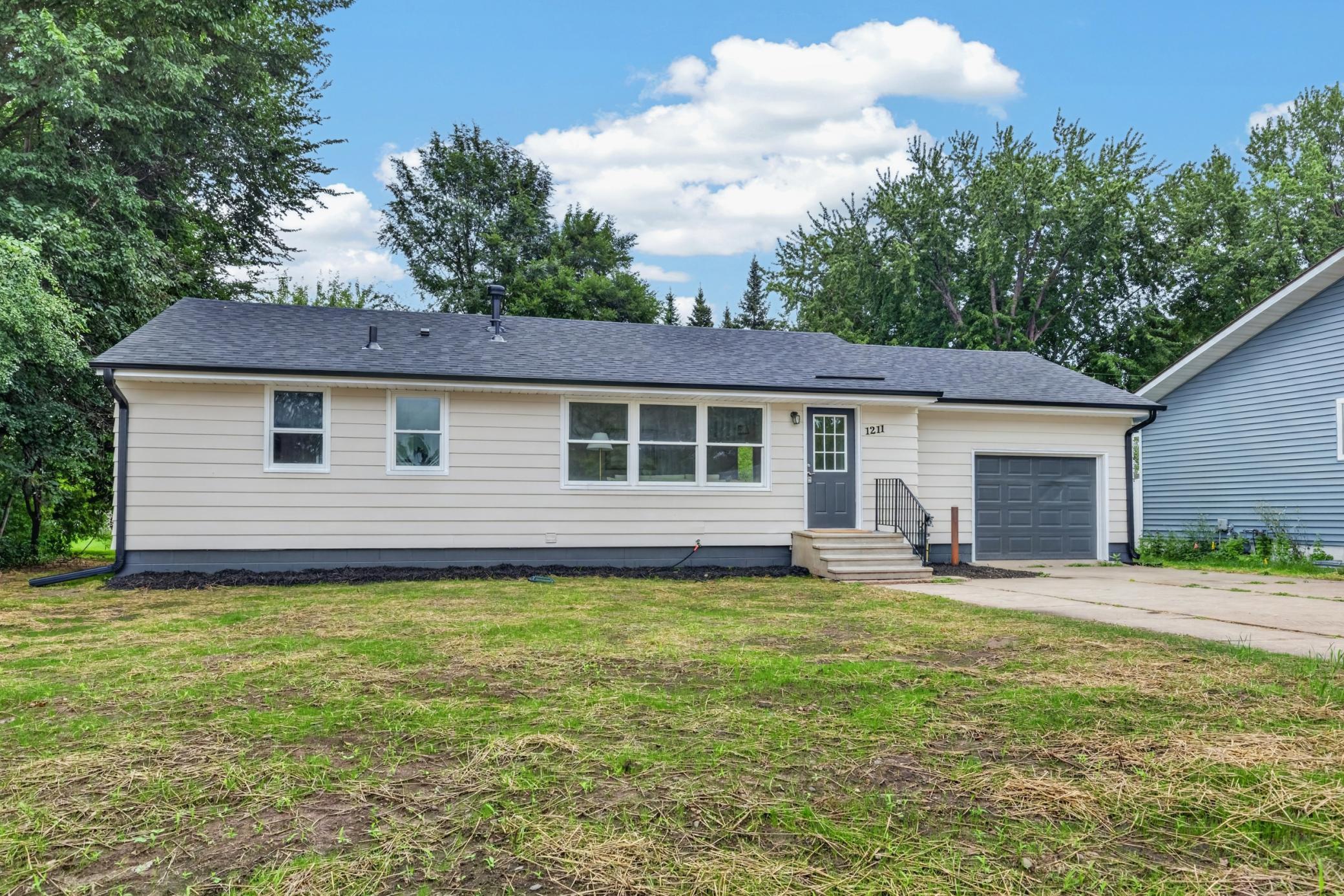 View of Single Family at 1211 Sunnyside Drive, Farmington - Mike Wilen | Minnesota Team Real Estate