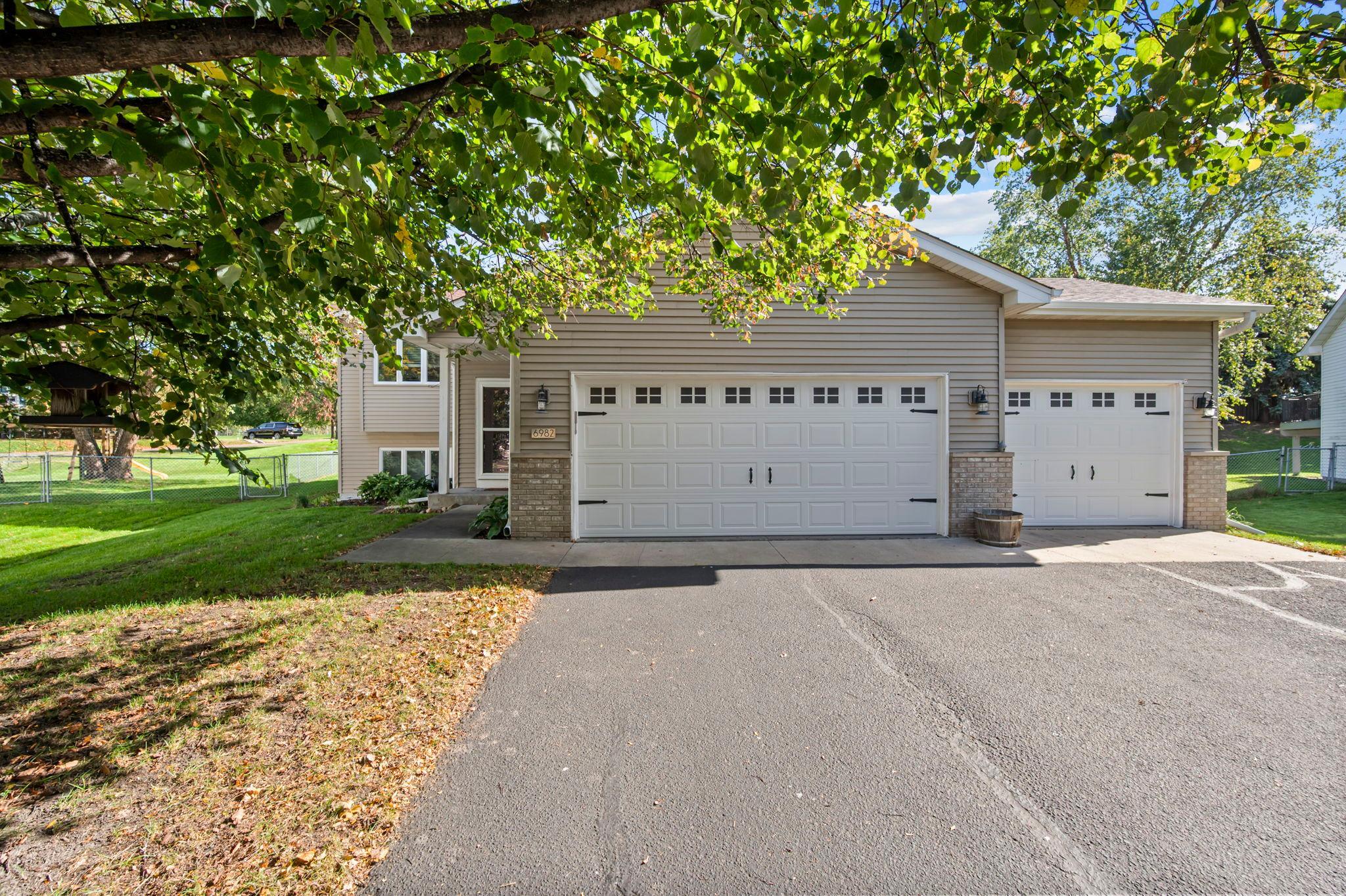 View of Single Family at 6982 Carlyle Road, Woodbury - Mike Wilen | Minnesota Team Real Estate