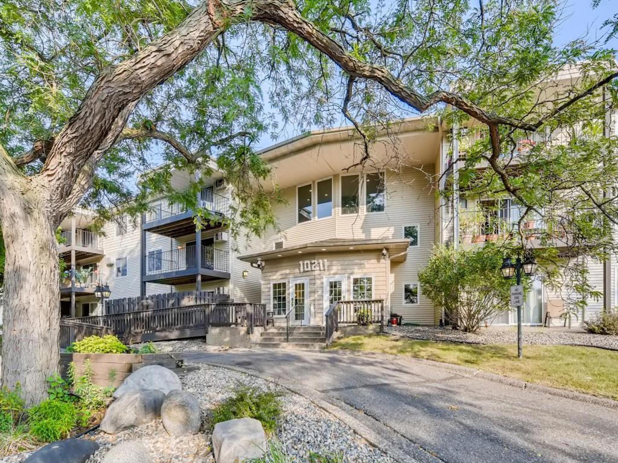 View of (CC) Low Rise (3- Levels) at 10211 Cedar Lake Road, Minnetonka - Mike Wilen | Minnesota Team Real Estate