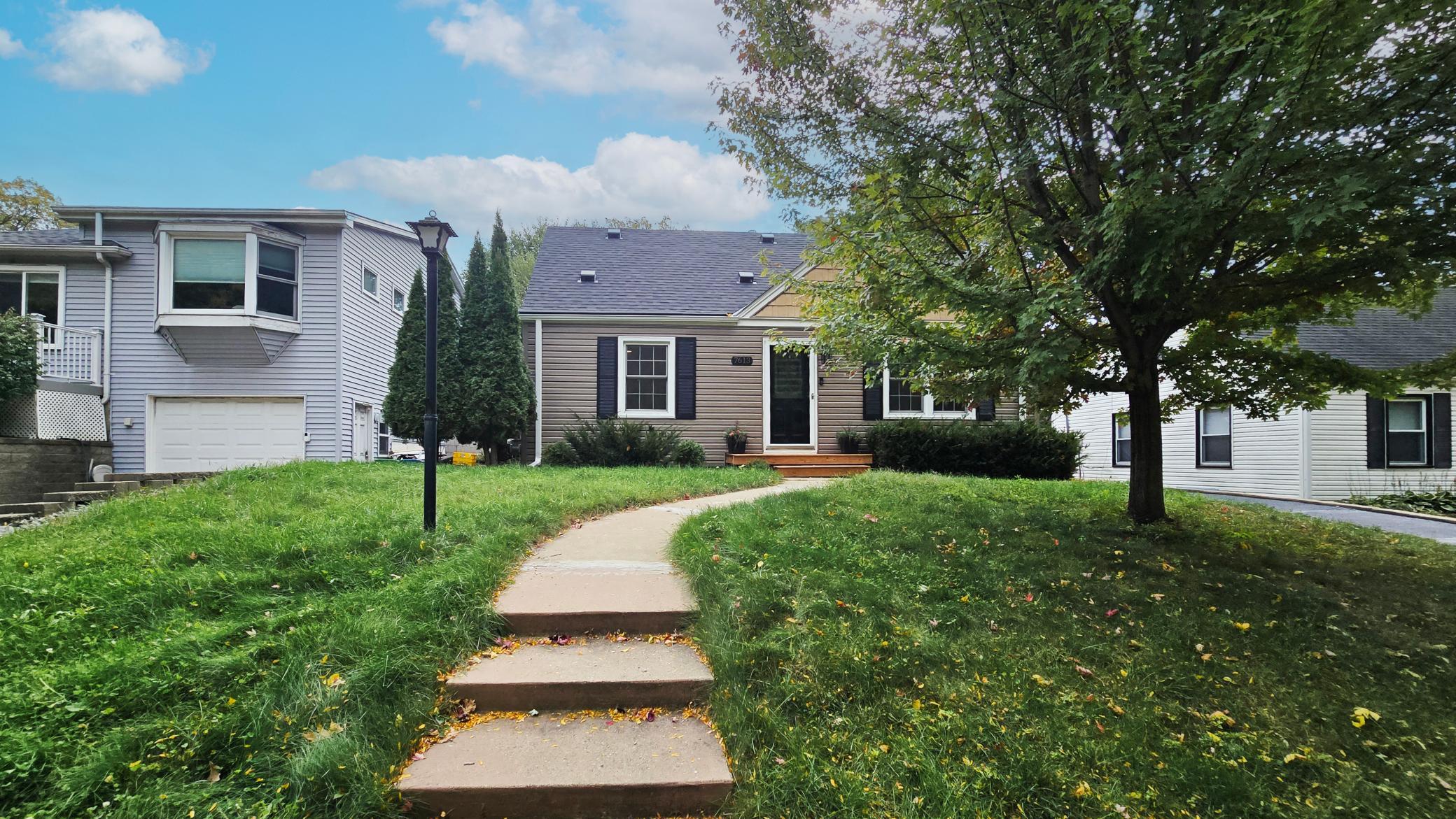 View of Single Family at 7613 Lake Street, Saint Louis Park - Mike Wilen | Minnesota Team Real Estate