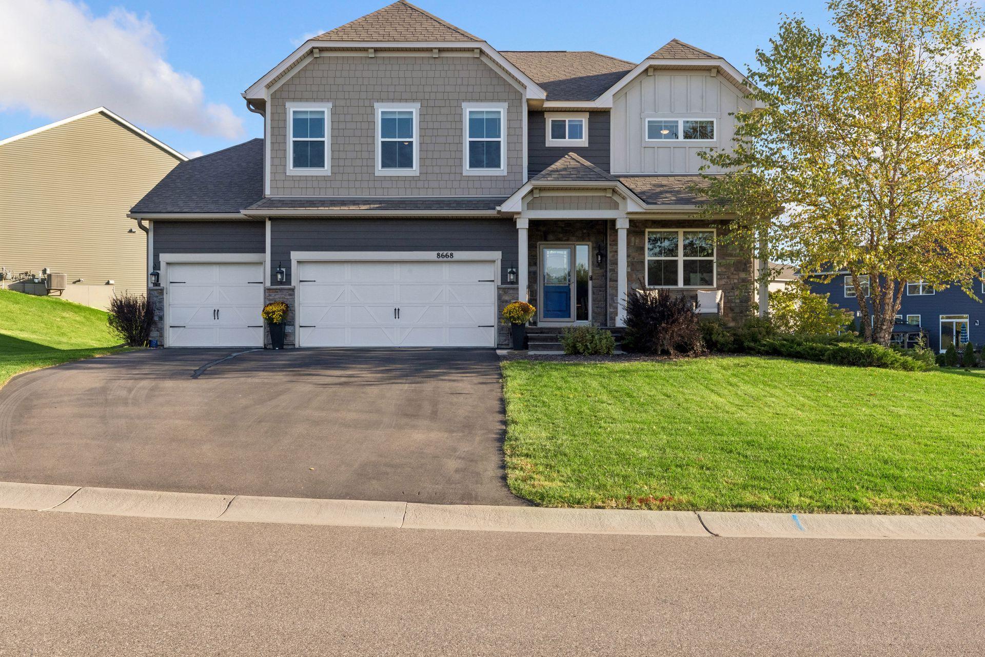View of Single Family at 8668 Platinum Drive, Woodbury - Mike Wilen | Minnesota Team Real Estate