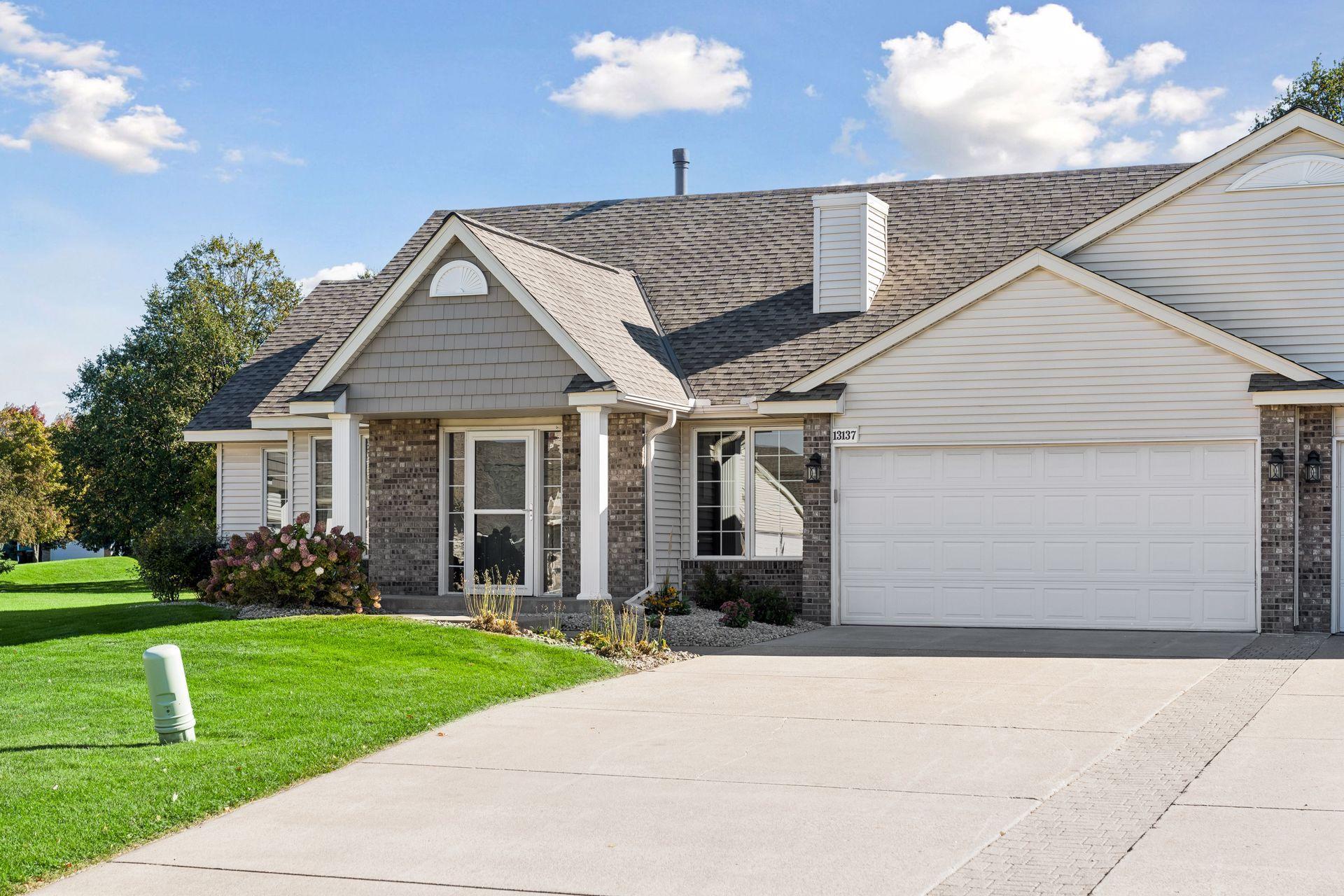View of (TH) Side x Side at 13137 Rose Street, Coon Rapids - Mike Wilen | Minnesota Team Real Estate
