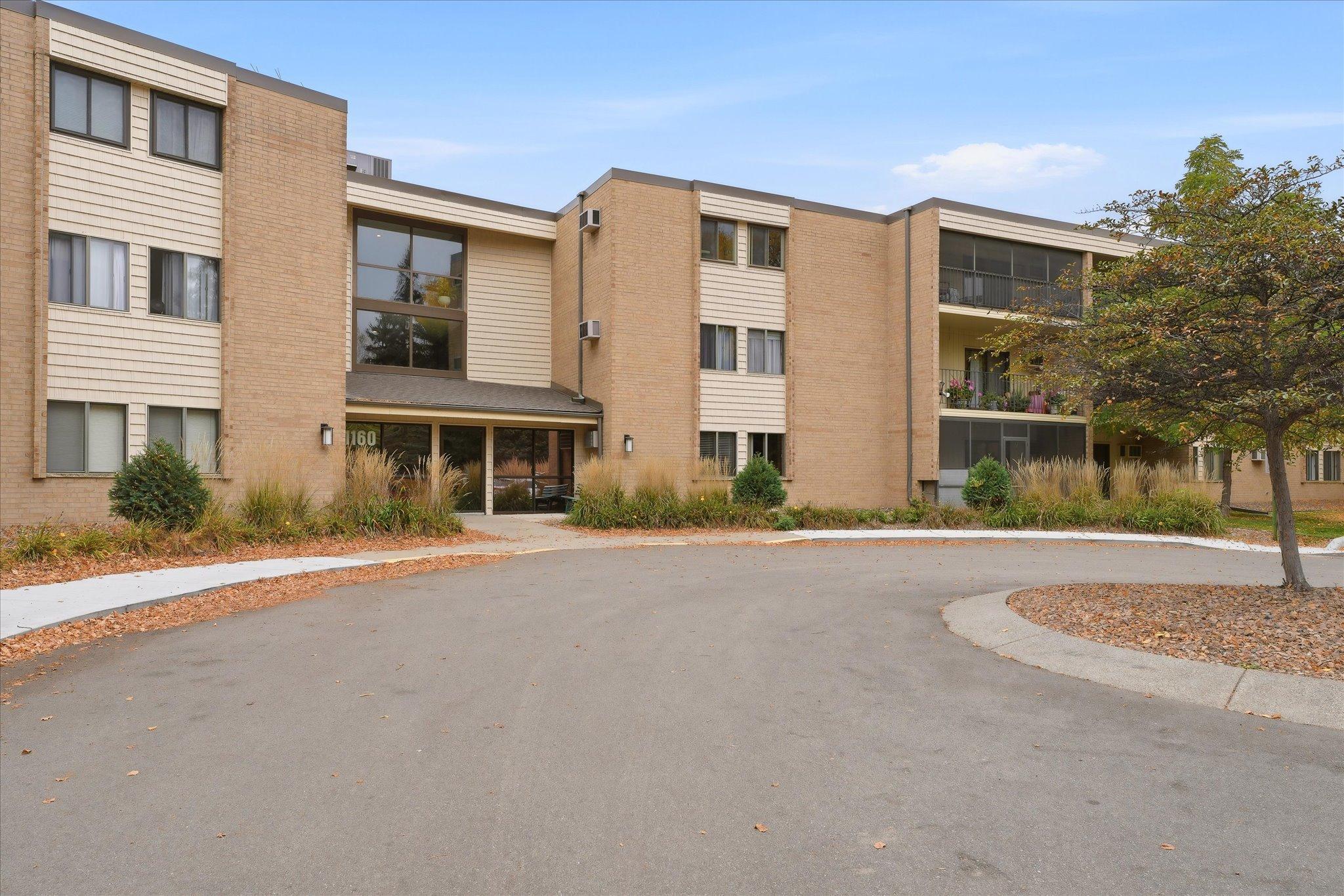 View of (CC) Low Rise (3- Levels) at 11160 Anderson Lakes Parkway, Eden Prairie - Mike Wilen | Minnesota Team Real Estate