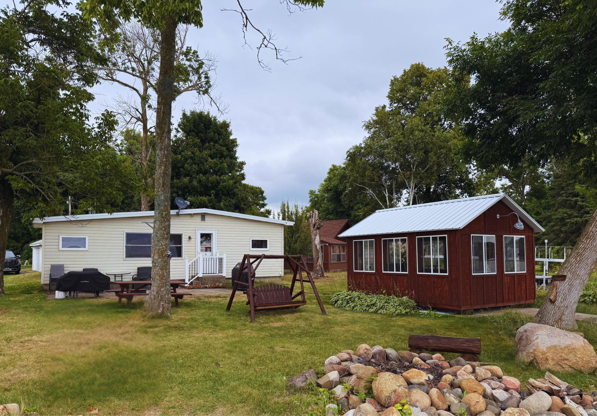 View of Single Family at 5589 Wildwood Avenue, Isle - Mike Wilen | Minnesota Team Real Estate