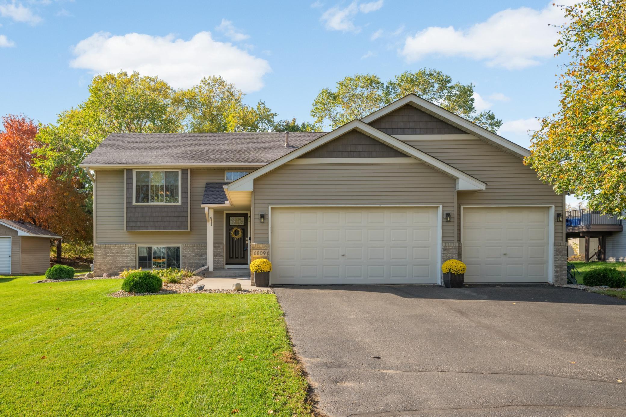 View of Single Family at 6809 91st Trail, Brooklyn Park - Mike Wilen | Minnesota Team Real Estate