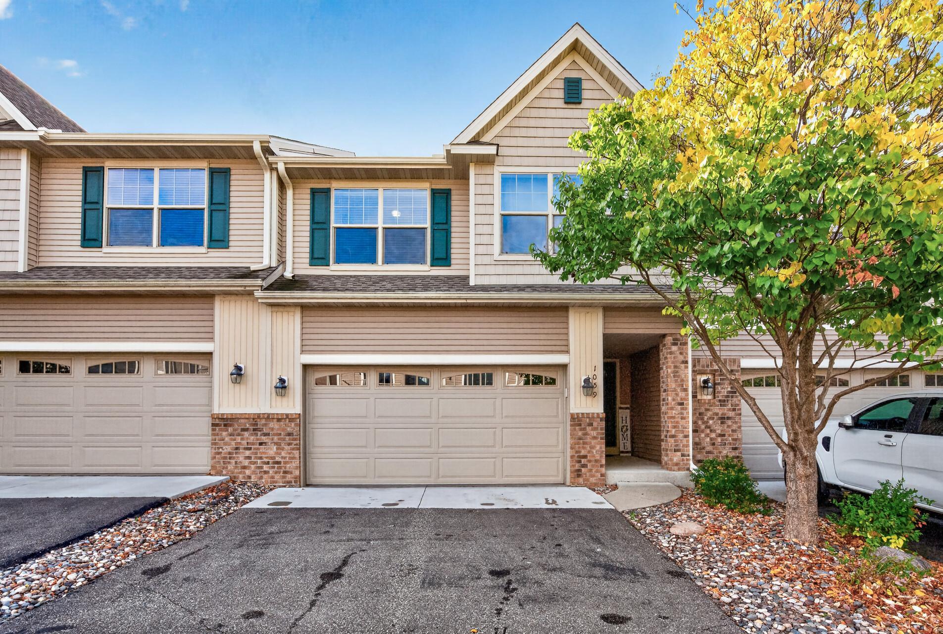 View of (TH) Side x Side at 1059 Drew Drive, Woodbury - Mike Wilen | Minnesota Team Real Estate