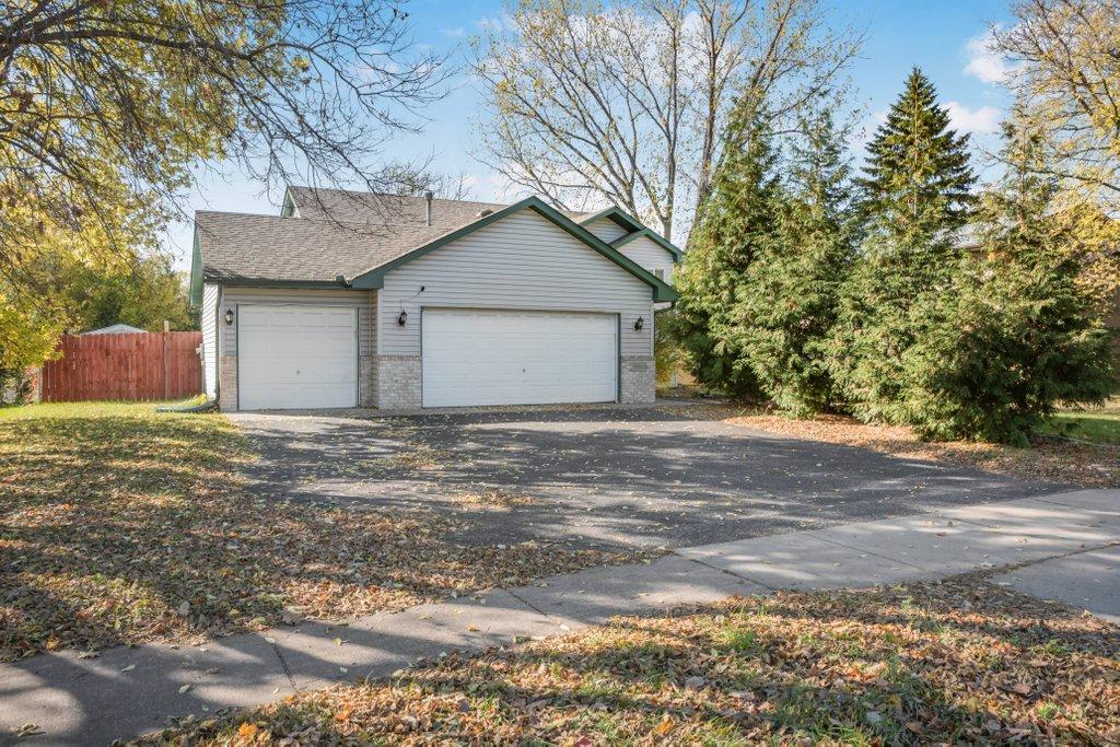 View of Single Family at 10560 Robinson Drive, Coon Rapids - Mike Wilen | Minnesota Team Real Estate